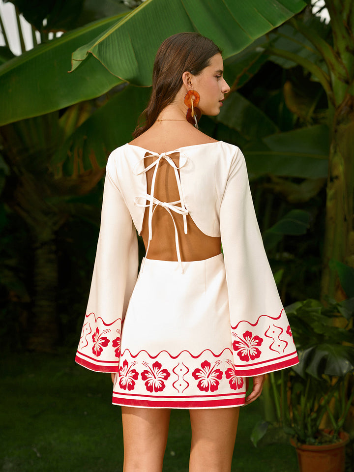 Robe dos nu à broderie florale et nouée