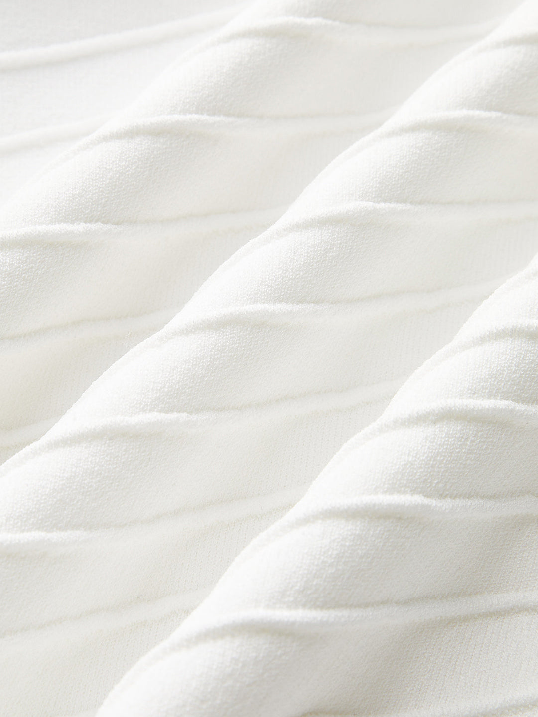 Robe en maille à découpes et détails chaîne