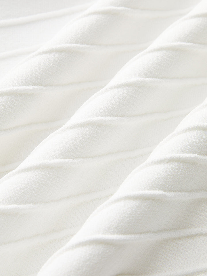 Robe en maille à découpes et détails chaîne