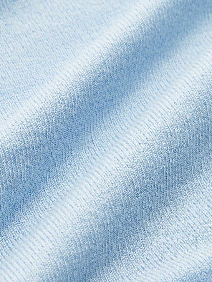 Haut enveloppant en mesh semi-transparent