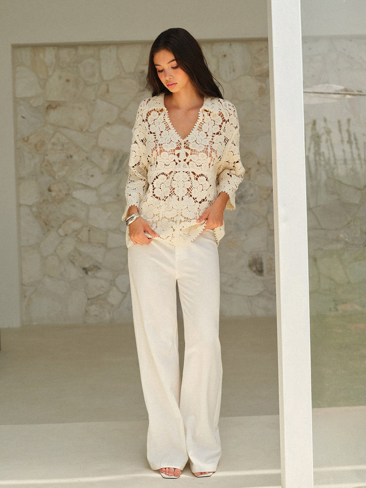 Haut en dentelle florale semi-transparente