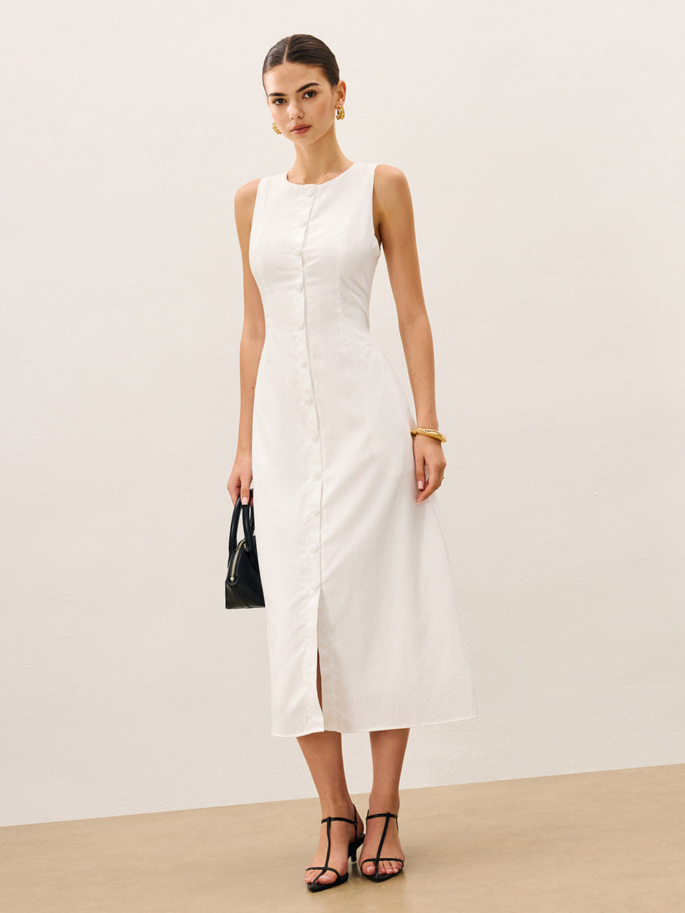 Robe sans manches en coton et lin avec boutonnage sur le devant sans ceinture