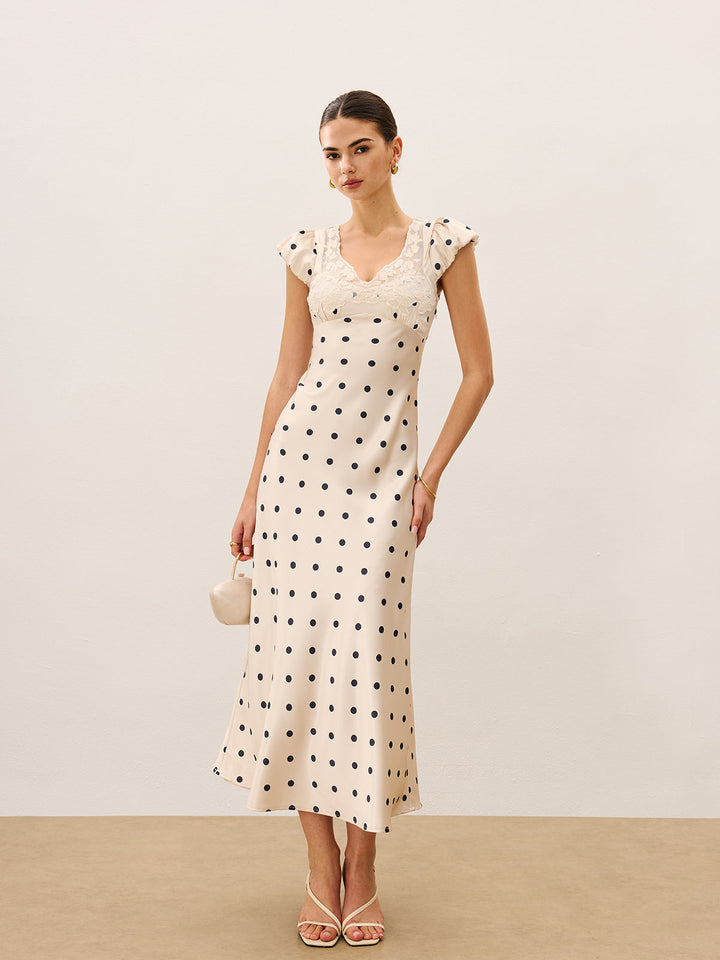 Robe à pois avec bordure en dentelle
