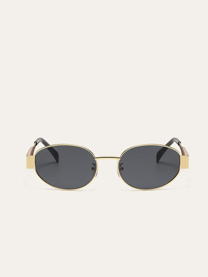 Lunettes de soleil ovales à bordure dorée