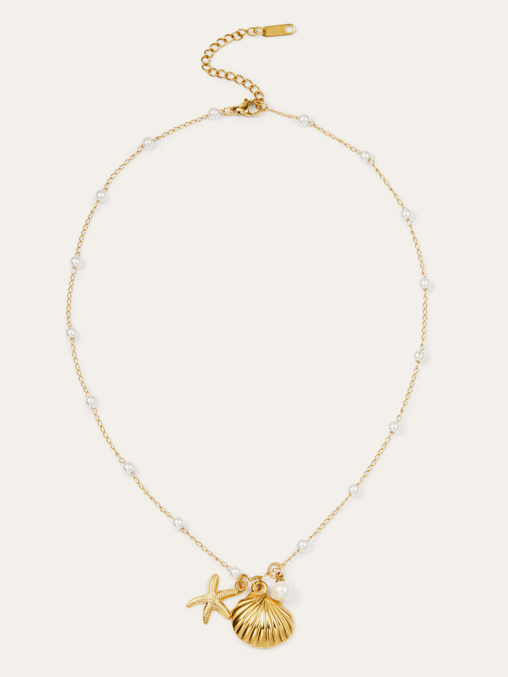 Collier "Coquillage Doré et Étoile de Mer" avec Perles