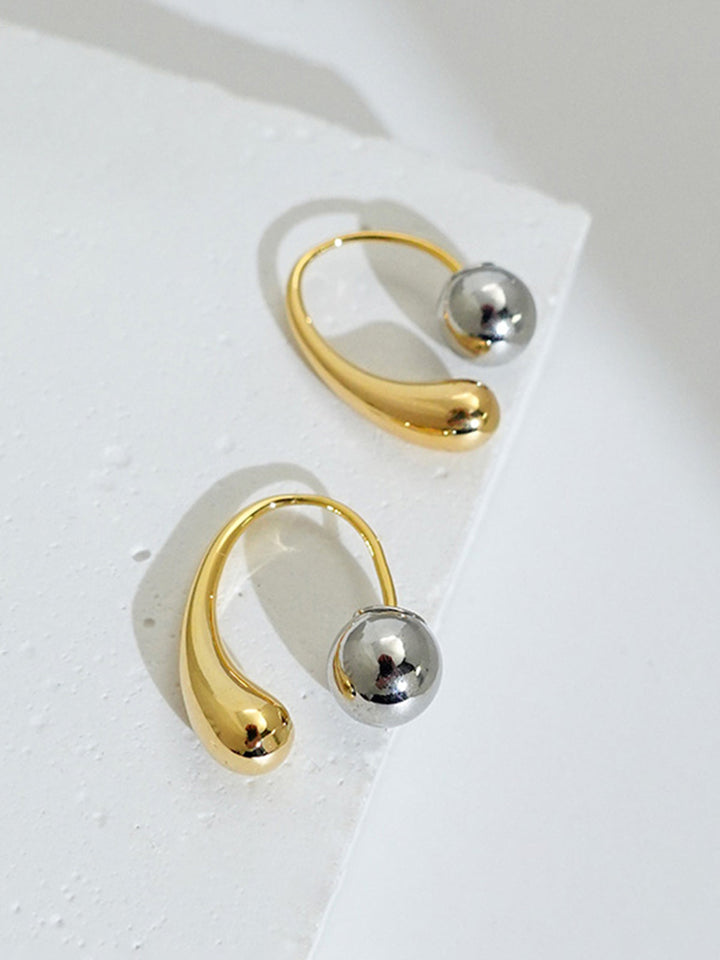 Boucles d'oreilles abstraites bicolores