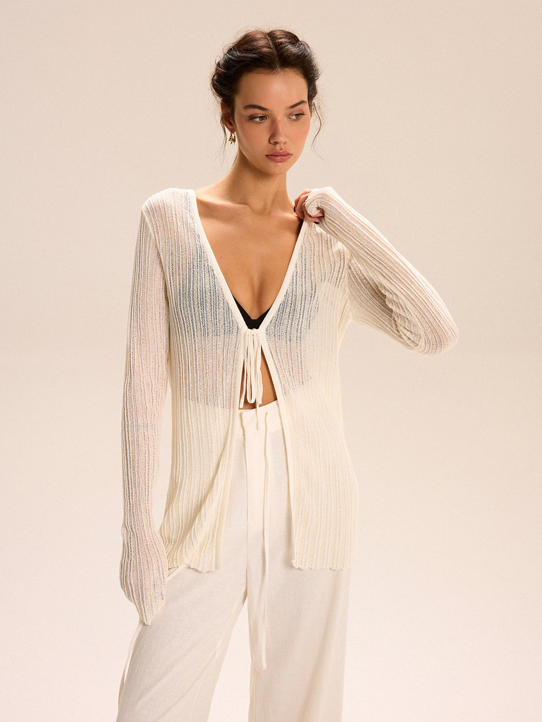 Cardigan en maille côtelée transparente avec fermeture à nouer