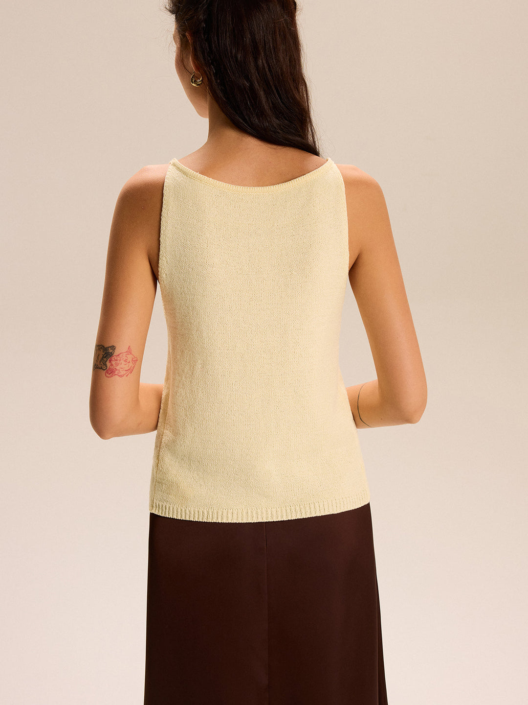Haut sans manches en tricot à boutons sur le devant