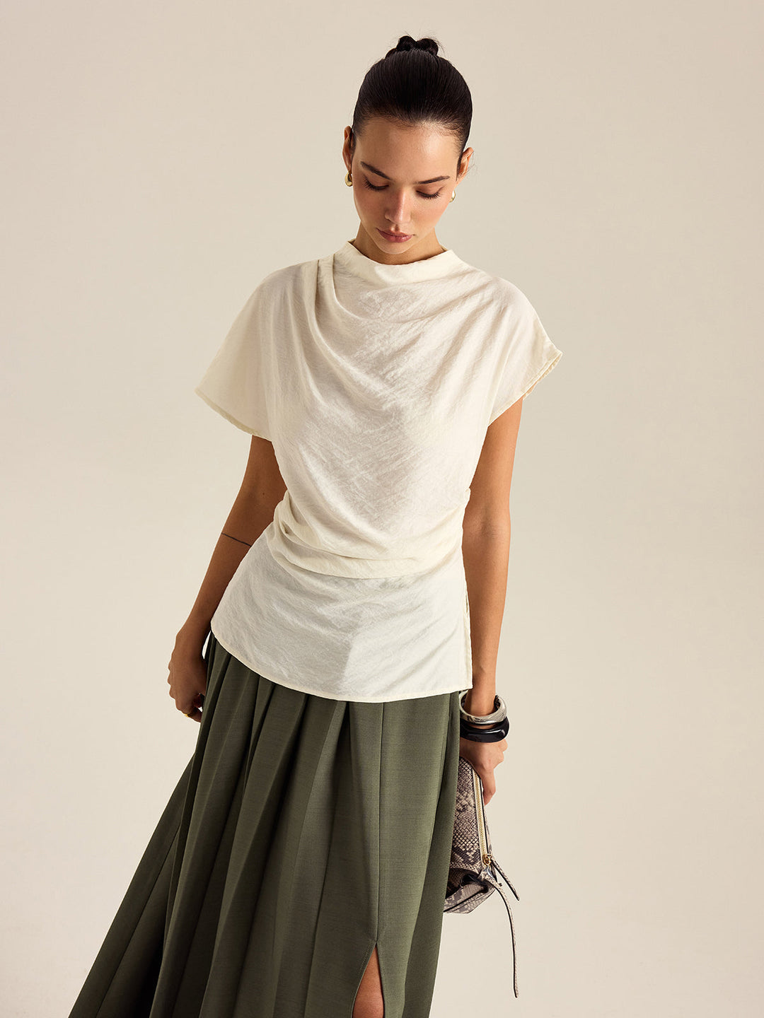 Blouse à col montant drapé