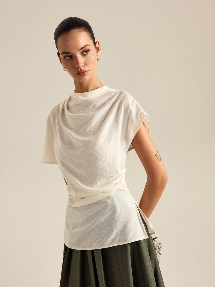 Blouse à col montant drapé