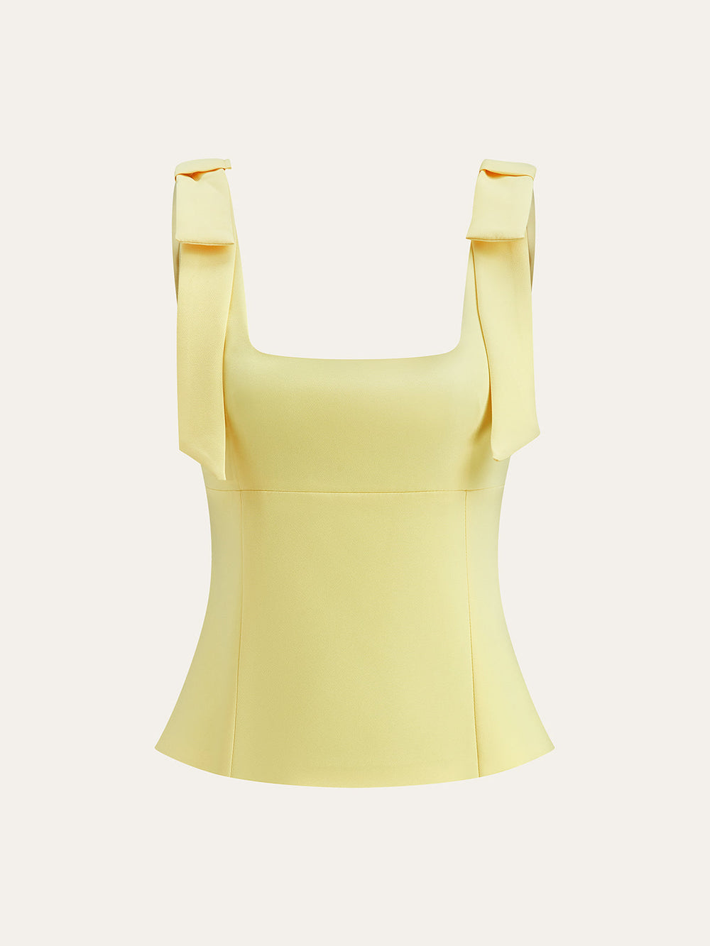 Haut à ceinture à bretelles noeud papillon