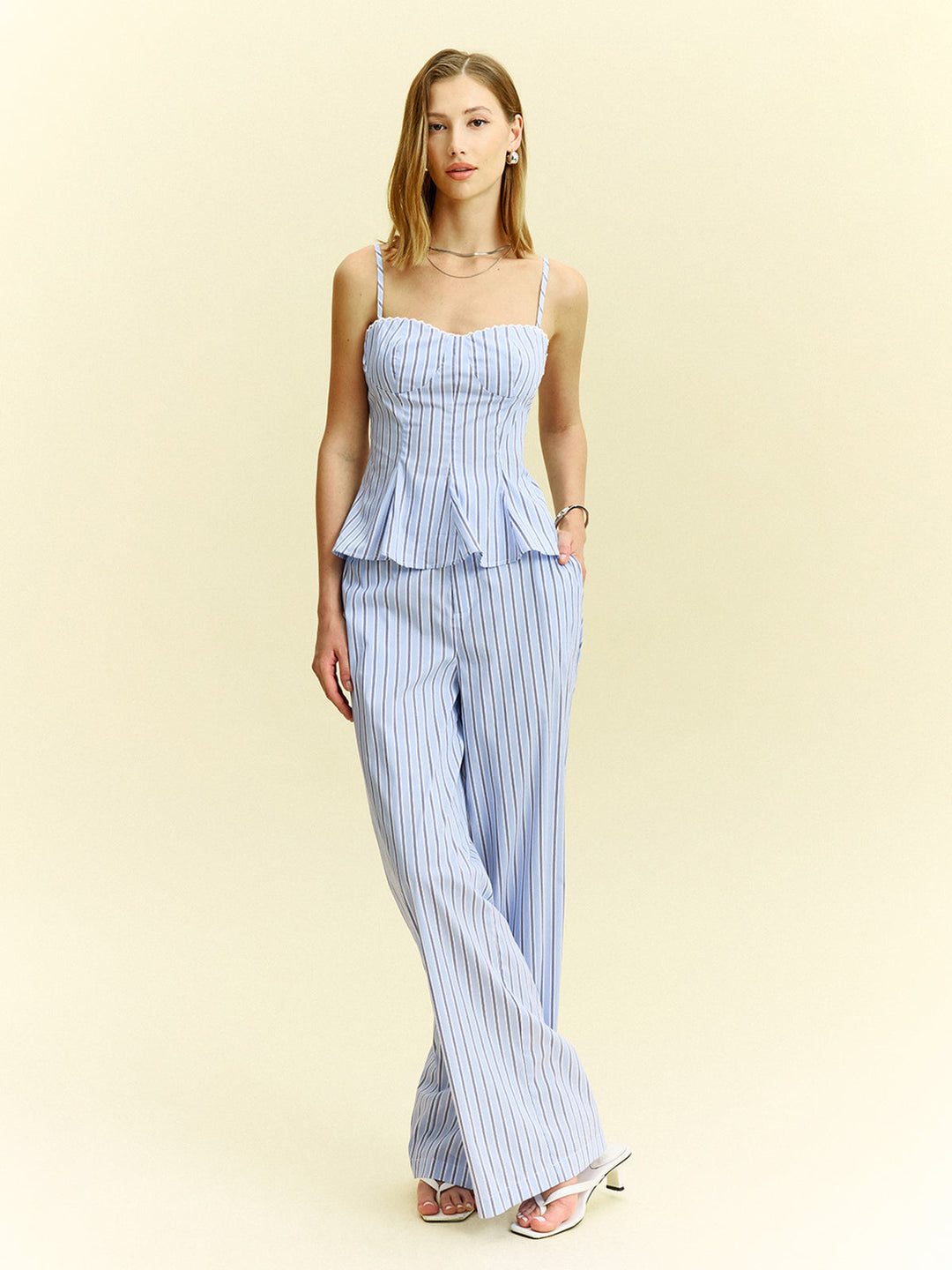 Ensemble haut péplum à rayures et pantalon large