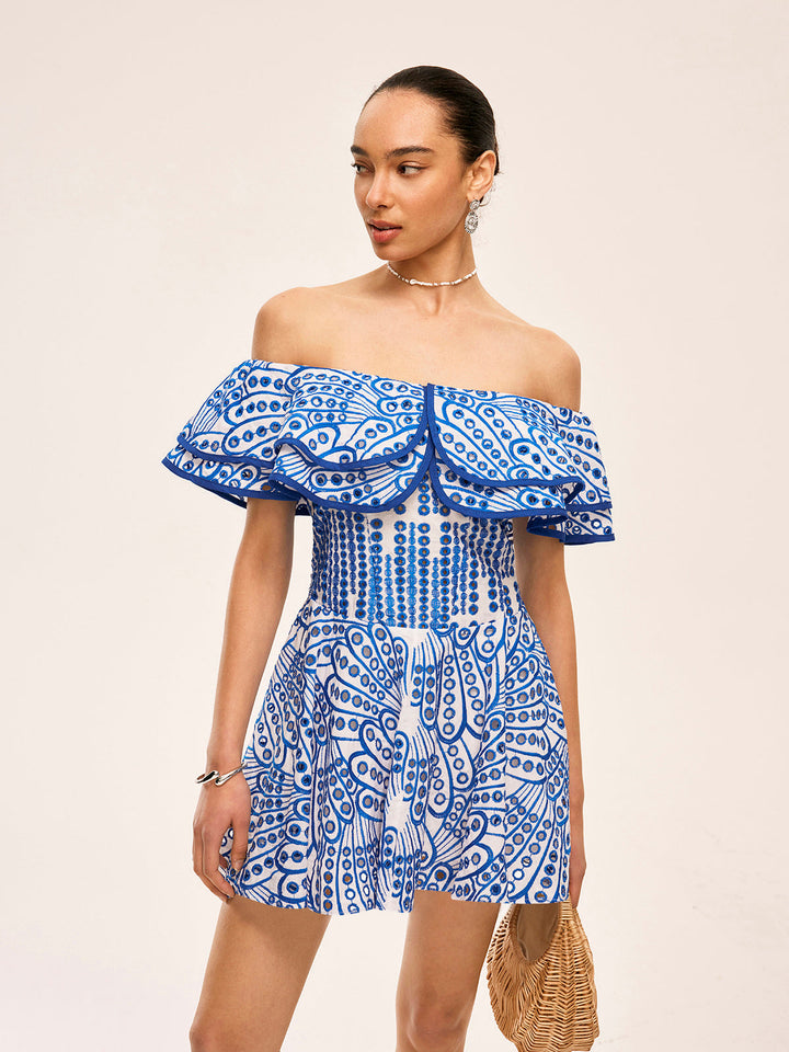 Robe à épaules dénudées à volants semi-transparente