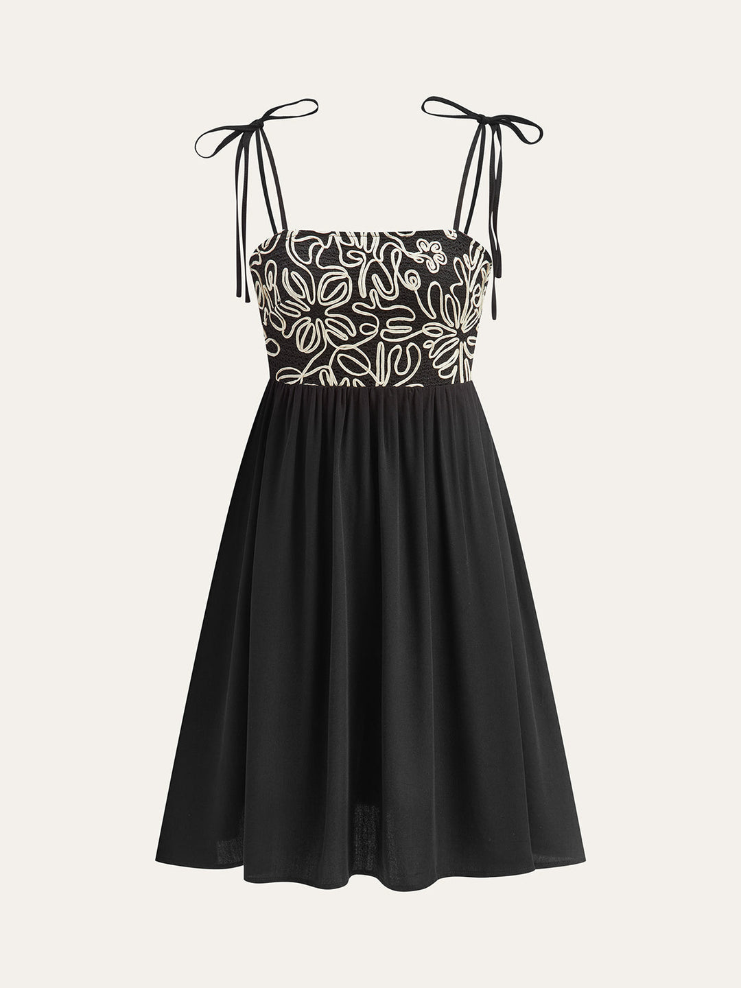 Robe mi-longue brodée à bretelles à nouer