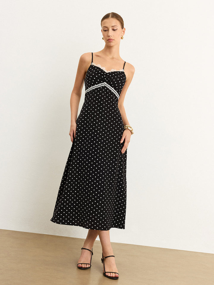 Robe mi-longue à pois avec bordure en dentelle