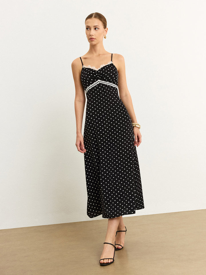 Robe mi-longue à pois avec bordure en dentelle