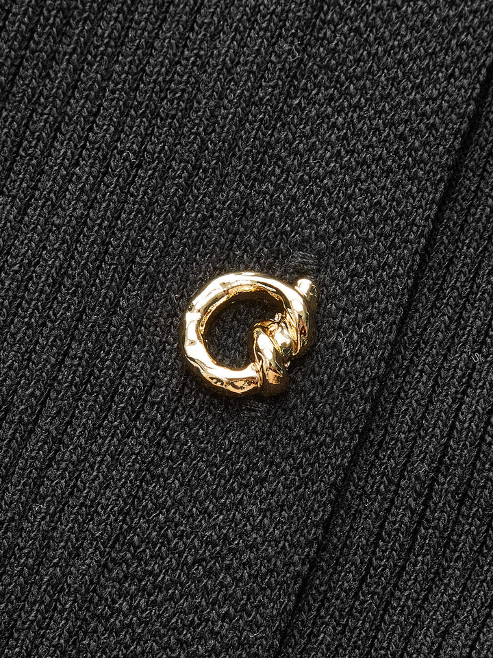 Robe mi-longue boutonnée en tricot côtelé