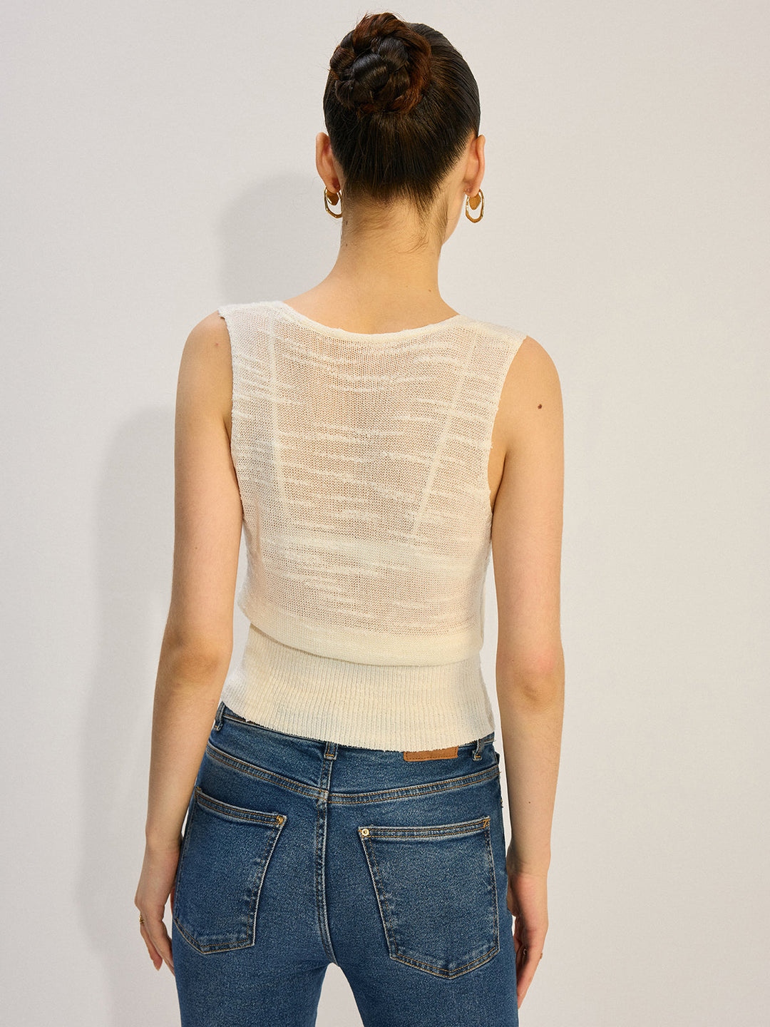 Haut sans manches en tricot avec décor en métal
