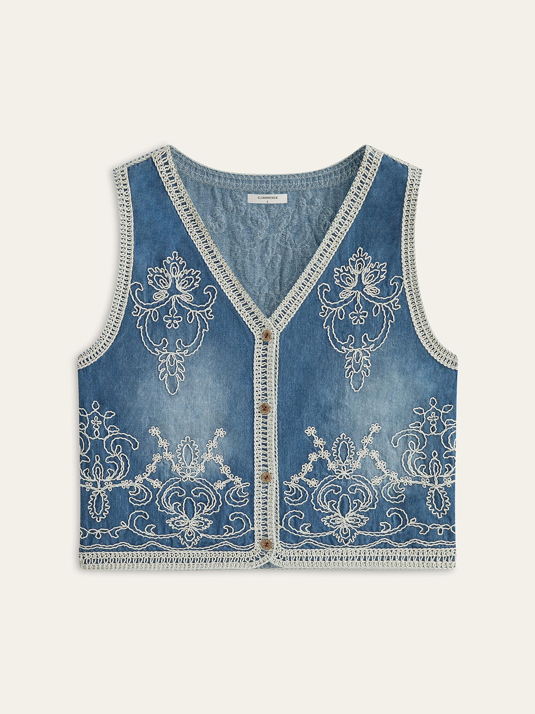Gilet boutonné en jean brodé