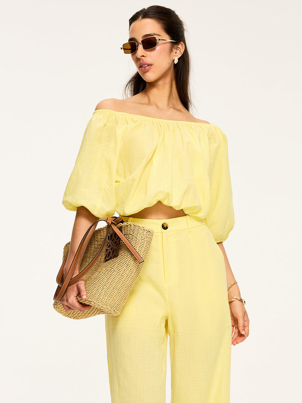Blouse à manches bouffantes et nouée au dos