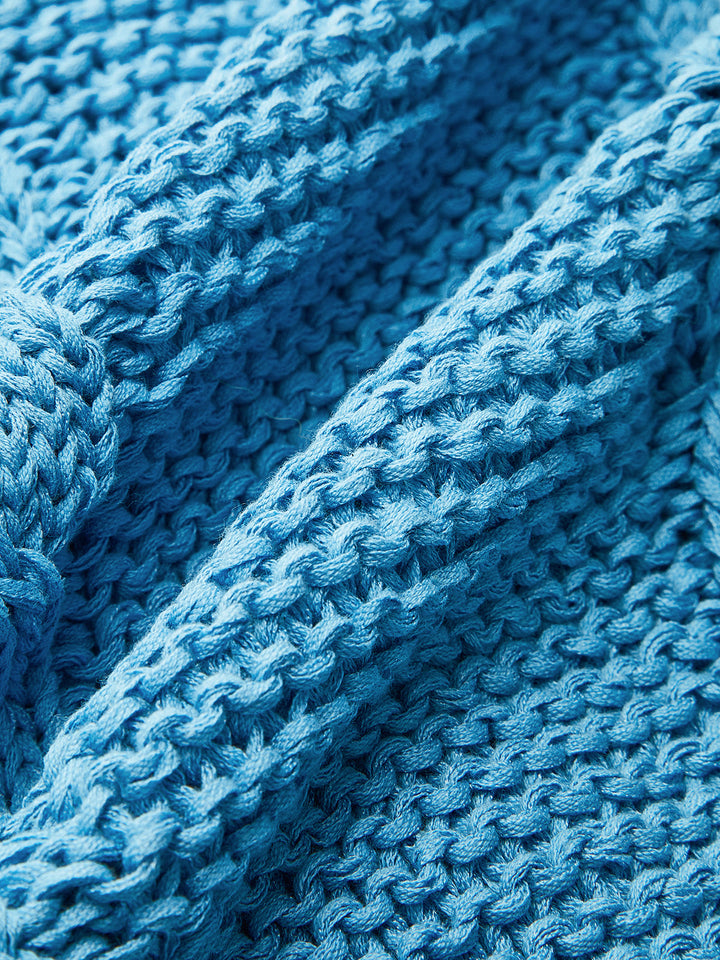 Gilet boutonné sans manches en maille côtelée