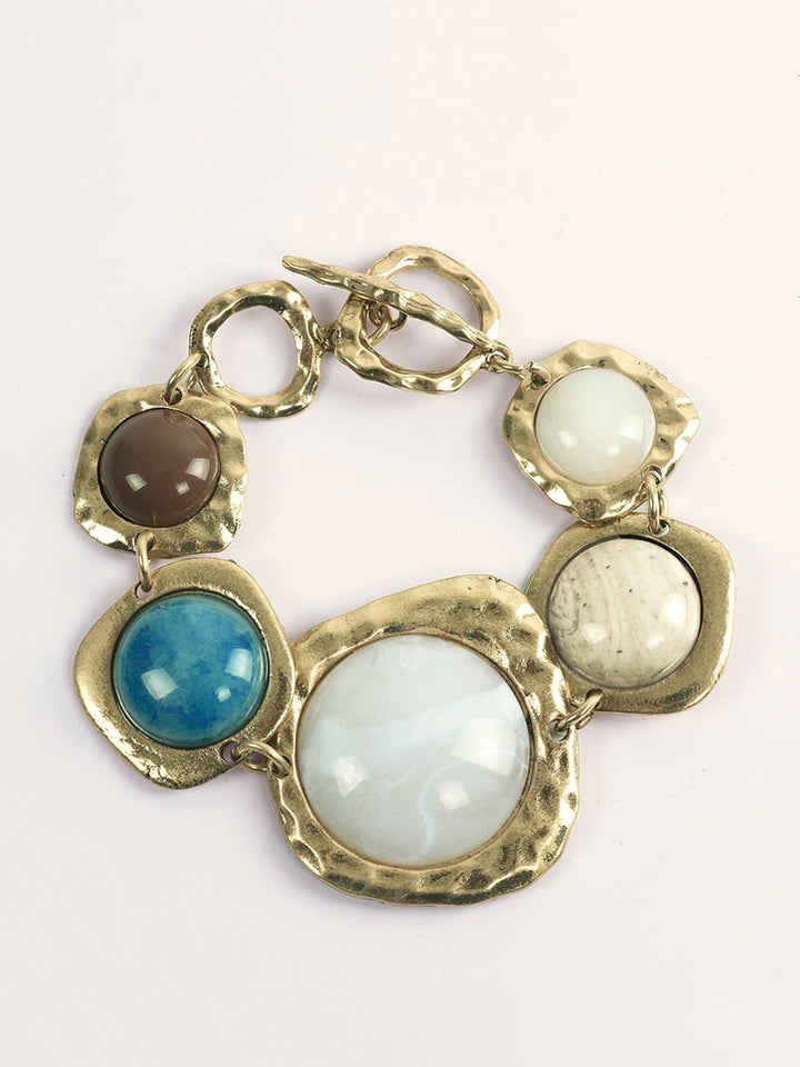 Bracelet à multiples pierres dorées