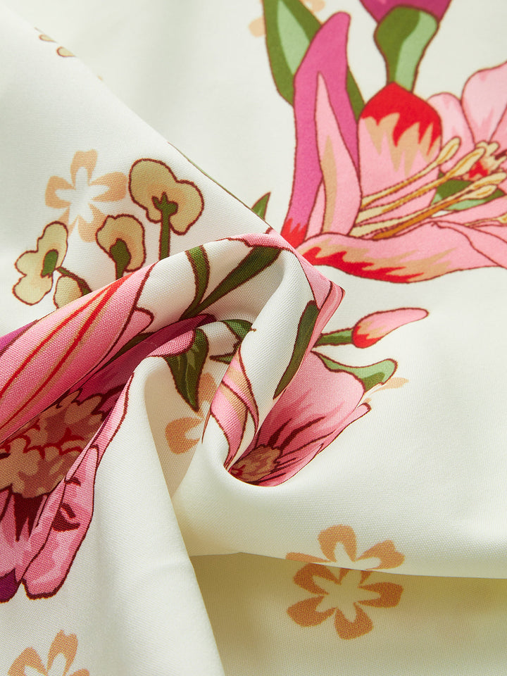 Combinaison Bodysuit à col en V et imprimé floral avec dos lacé