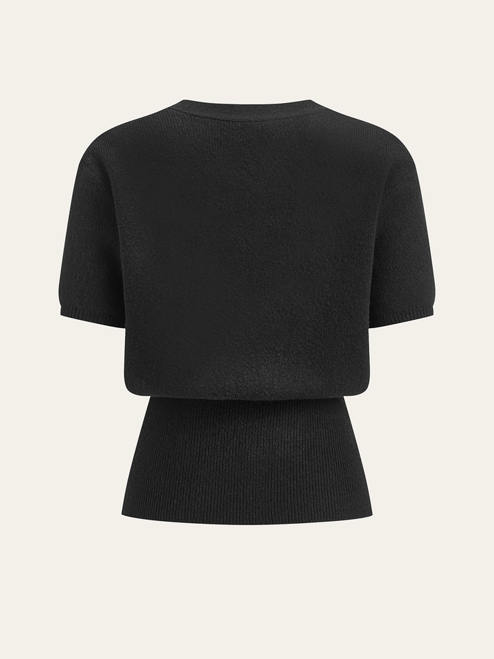 Pull à col en V avec boutons en métal