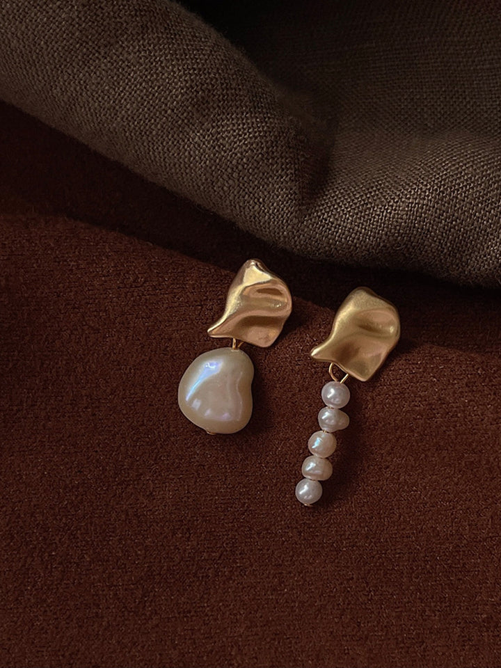 Boucles d'oreilles irrégulières en métal et perles