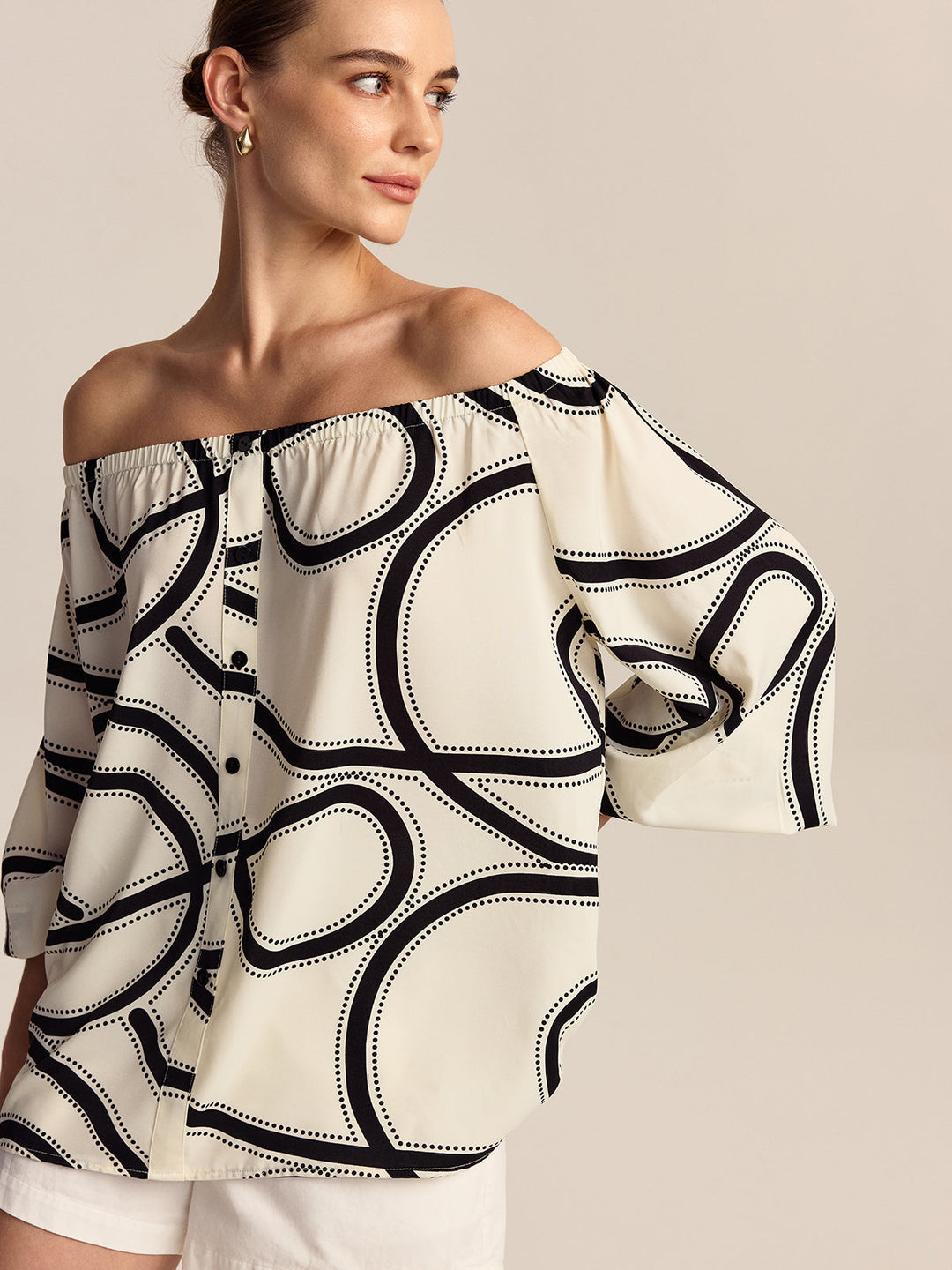 Blouse à épaules dénudées à motifs