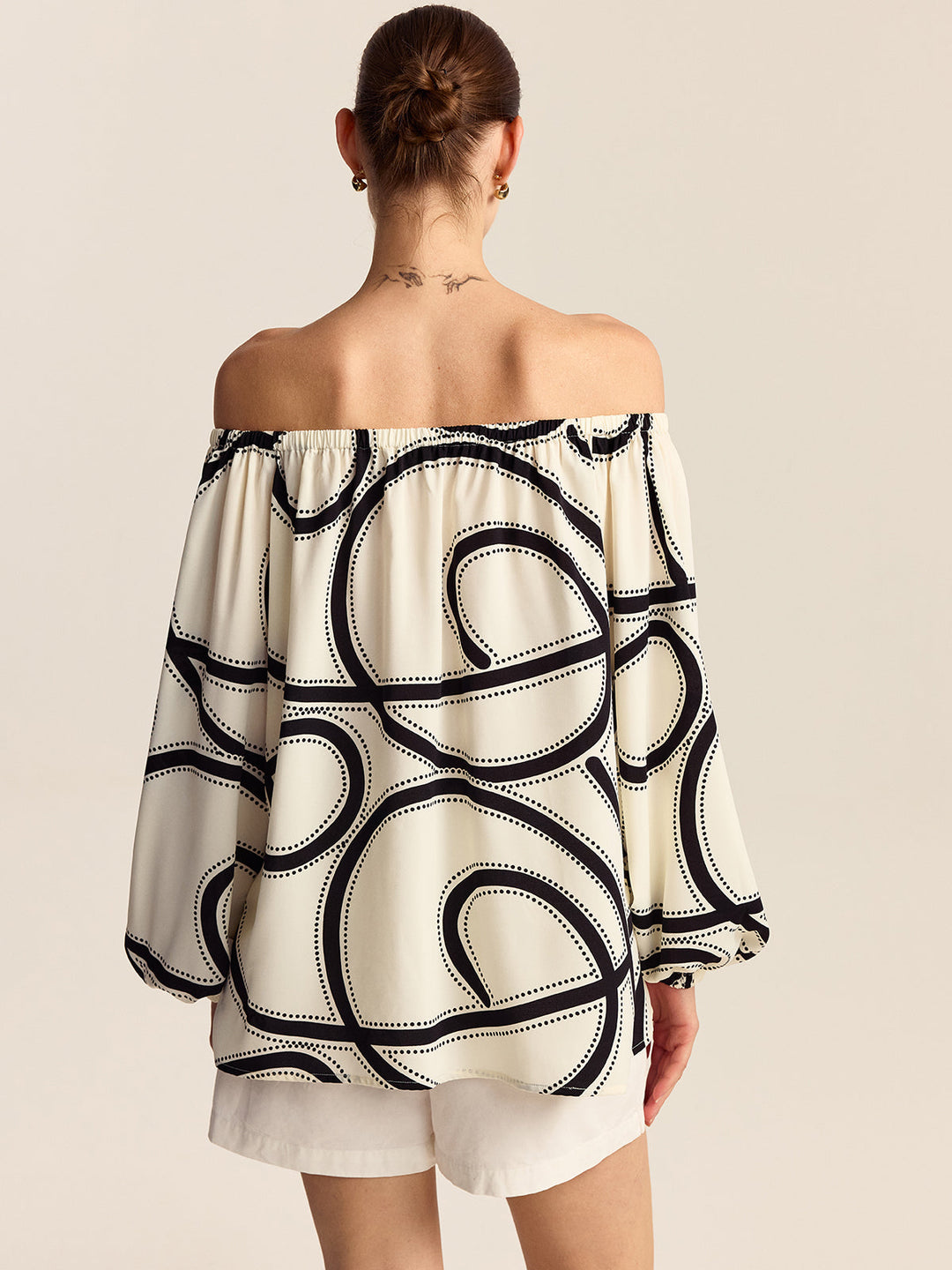 Blouse à épaules dénudées à motifs