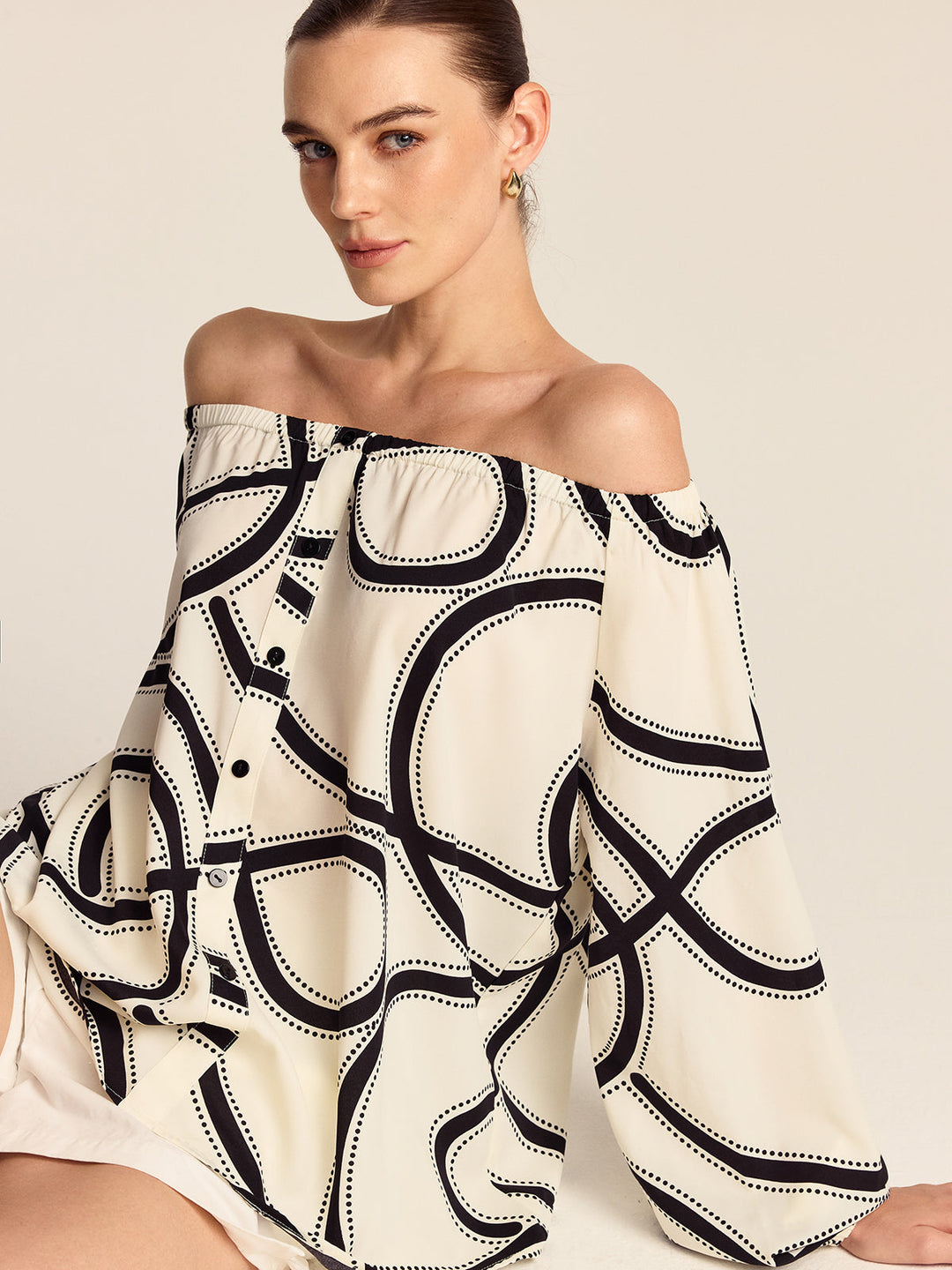 Blouse à épaules dénudées à motifs