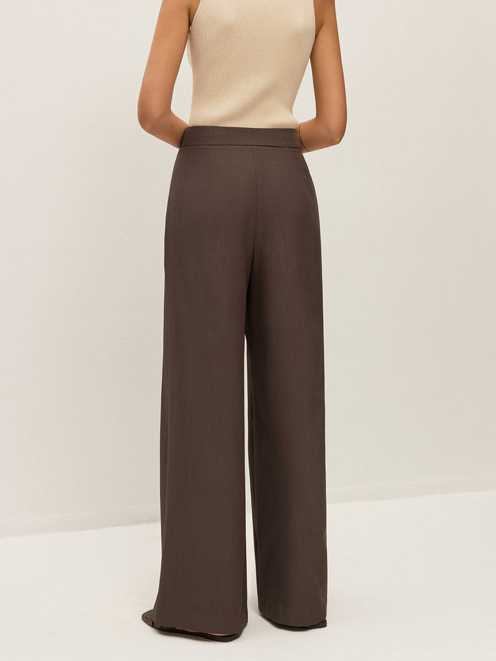 Pantalon plissé à détails métalliques mi-taille