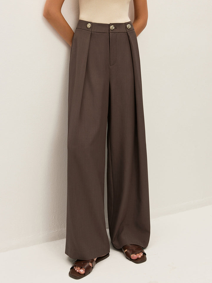 Pantalon plissé à détails métalliques mi-taille