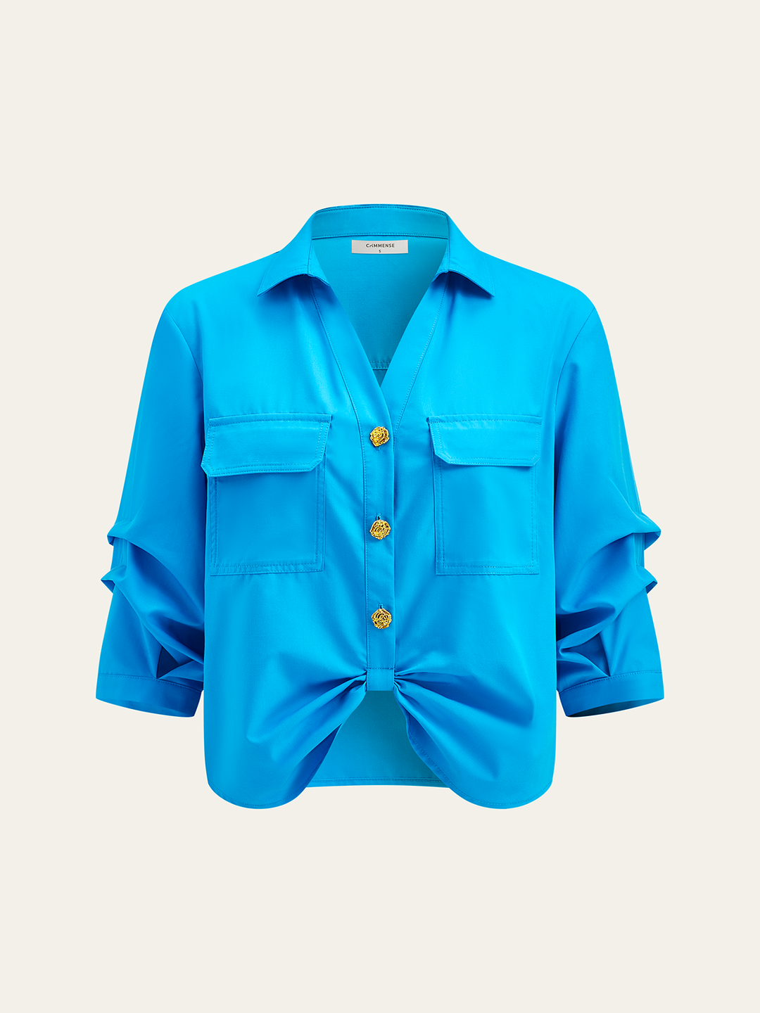 Blouse boutonnée à poche avec nœud avant