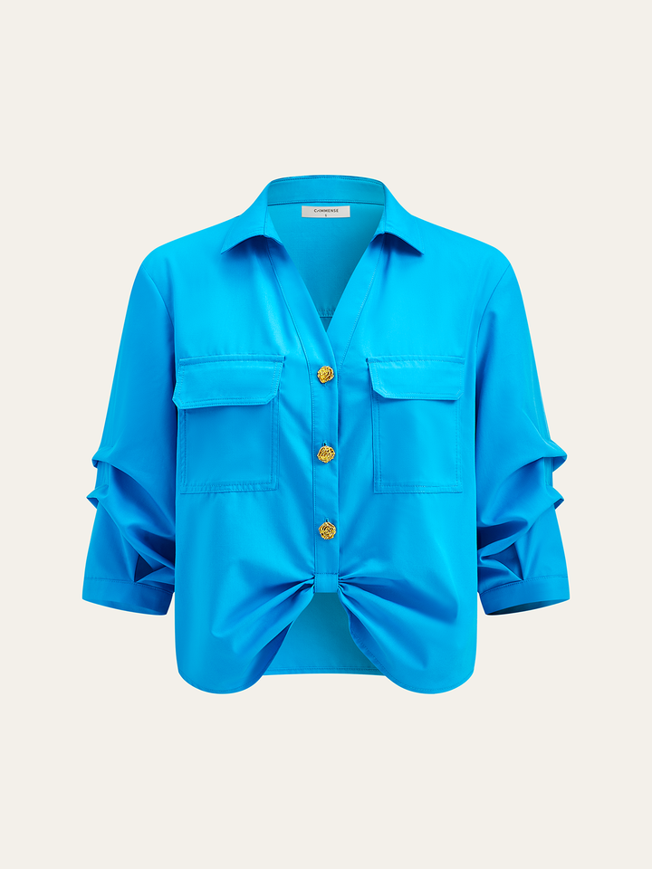 Blouse boutonnée à poche avec nœud avant