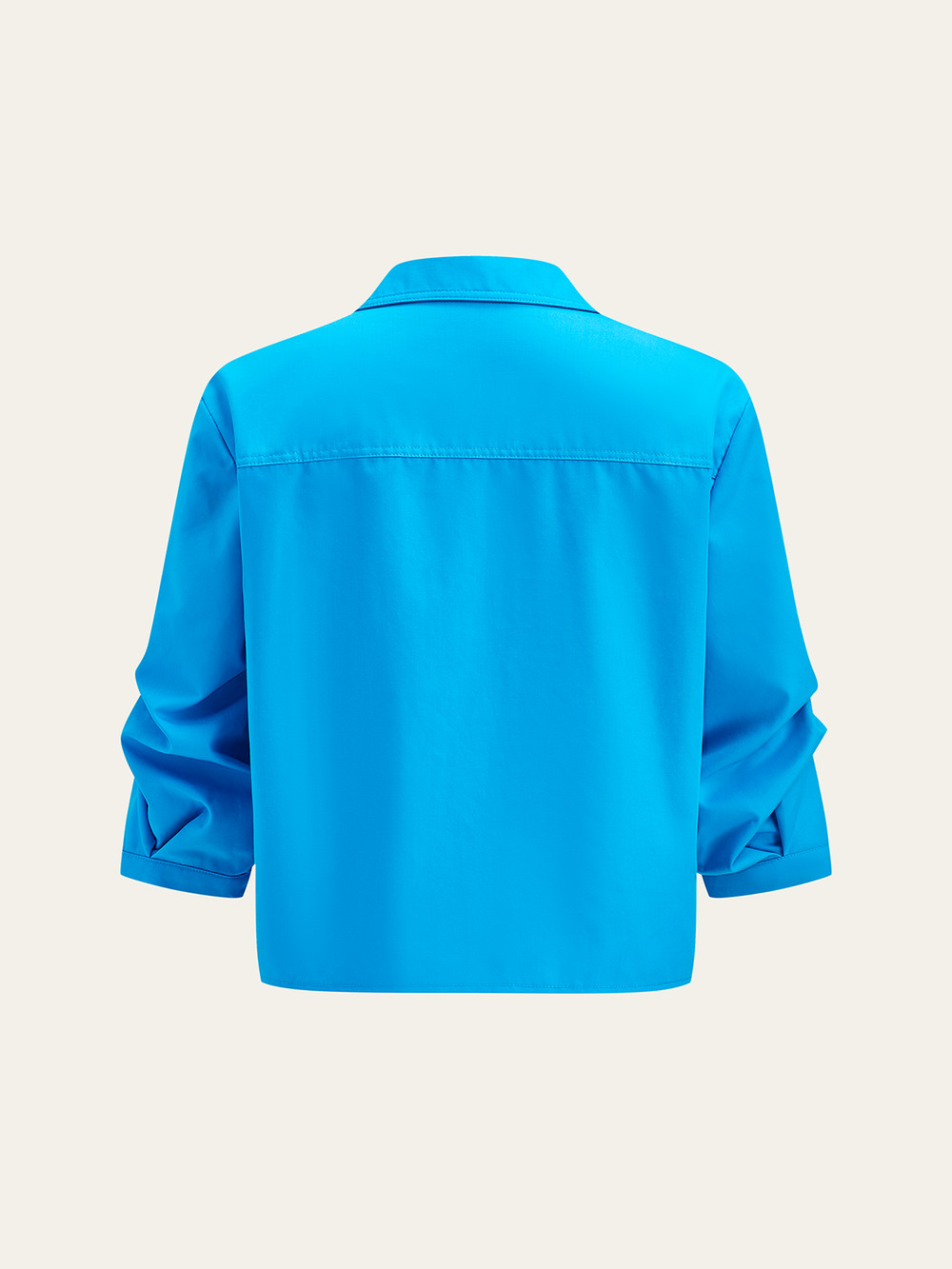 Blouse boutonnée à poche avec nœud avant