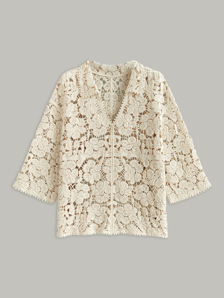 Haut en dentelle florale semi-transparente