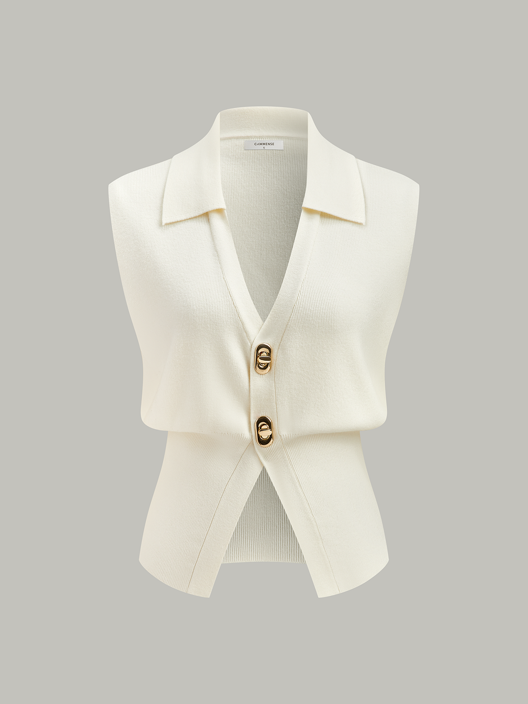 Gilet en tricot à boutons métalliques