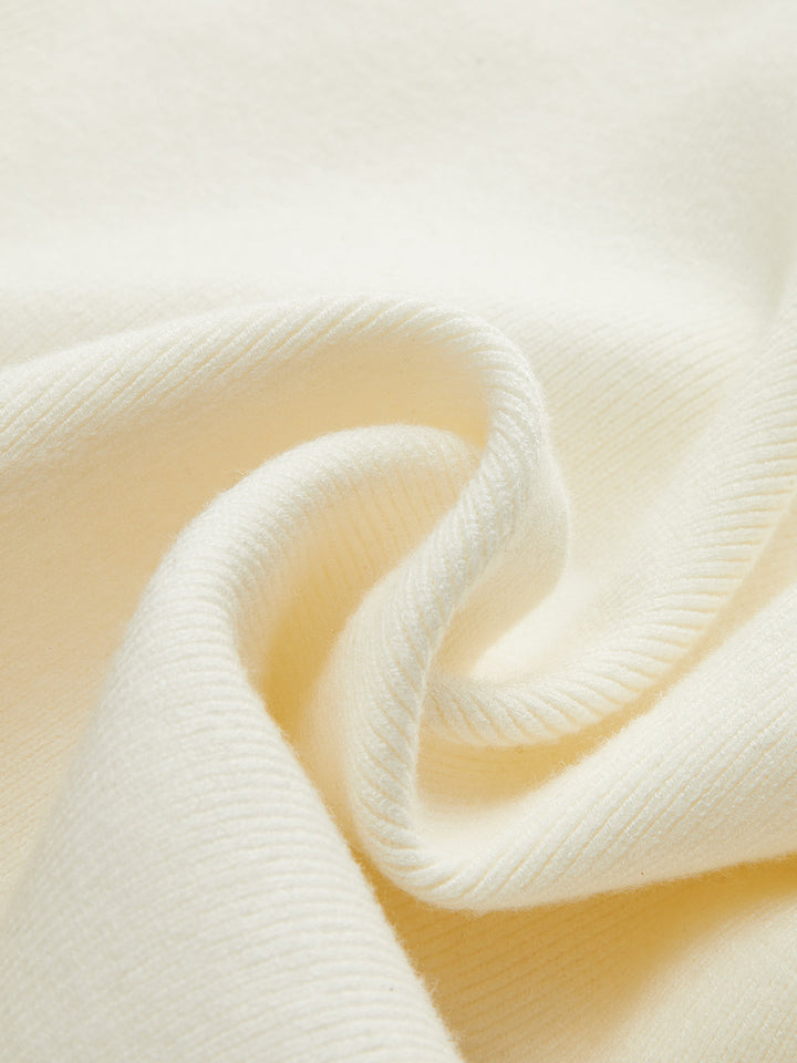 Gilet en tricot à boutons métalliques