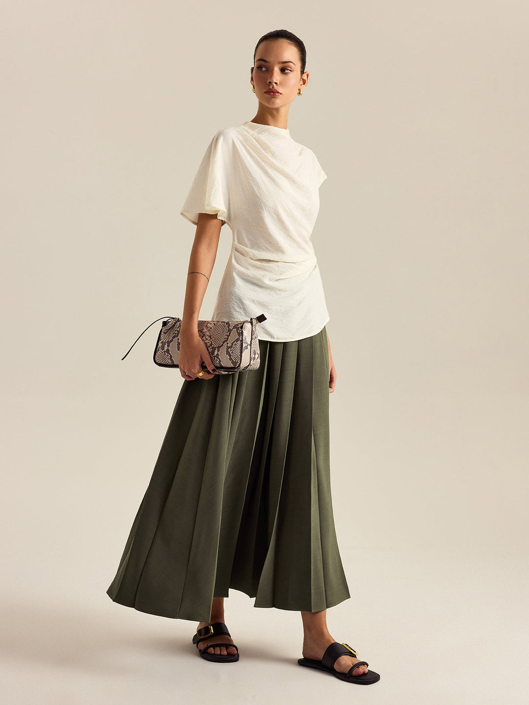 Blouse à col montant drapé