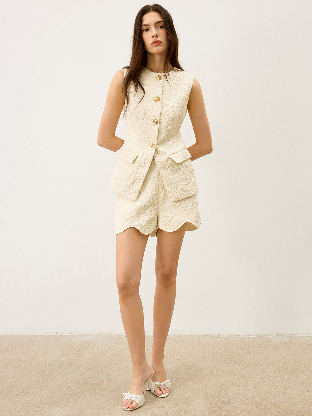 Gilet texturé en jacquard avec bouton en métal