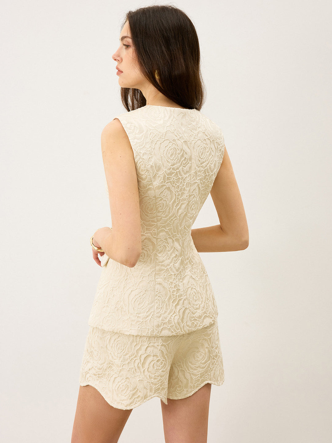 Gilet texturé en jacquard avec bouton en métal