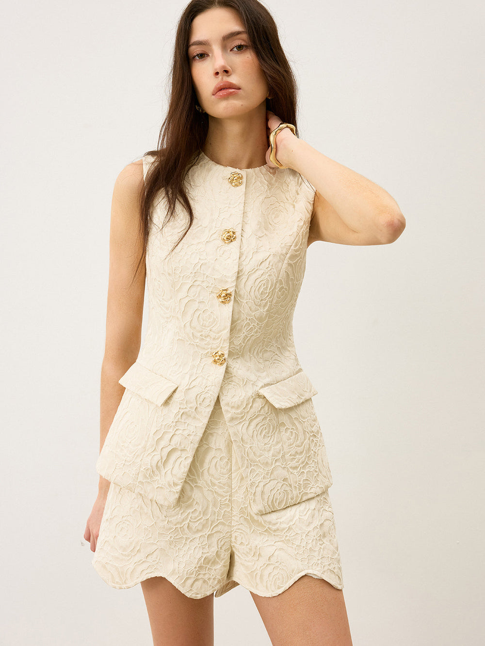 Gilet texturé en jacquard avec bouton en métal