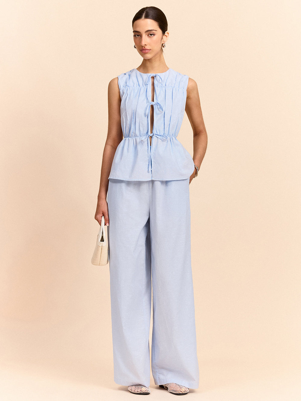 Ensemble pantalon en lin et coton noué à l'avant