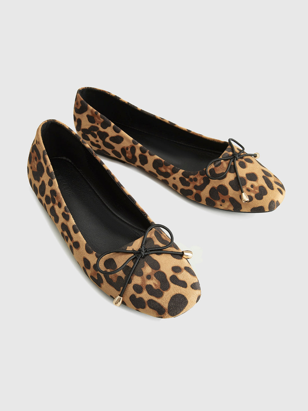 Ballerines imprimées léopard avec décoration de nœud
