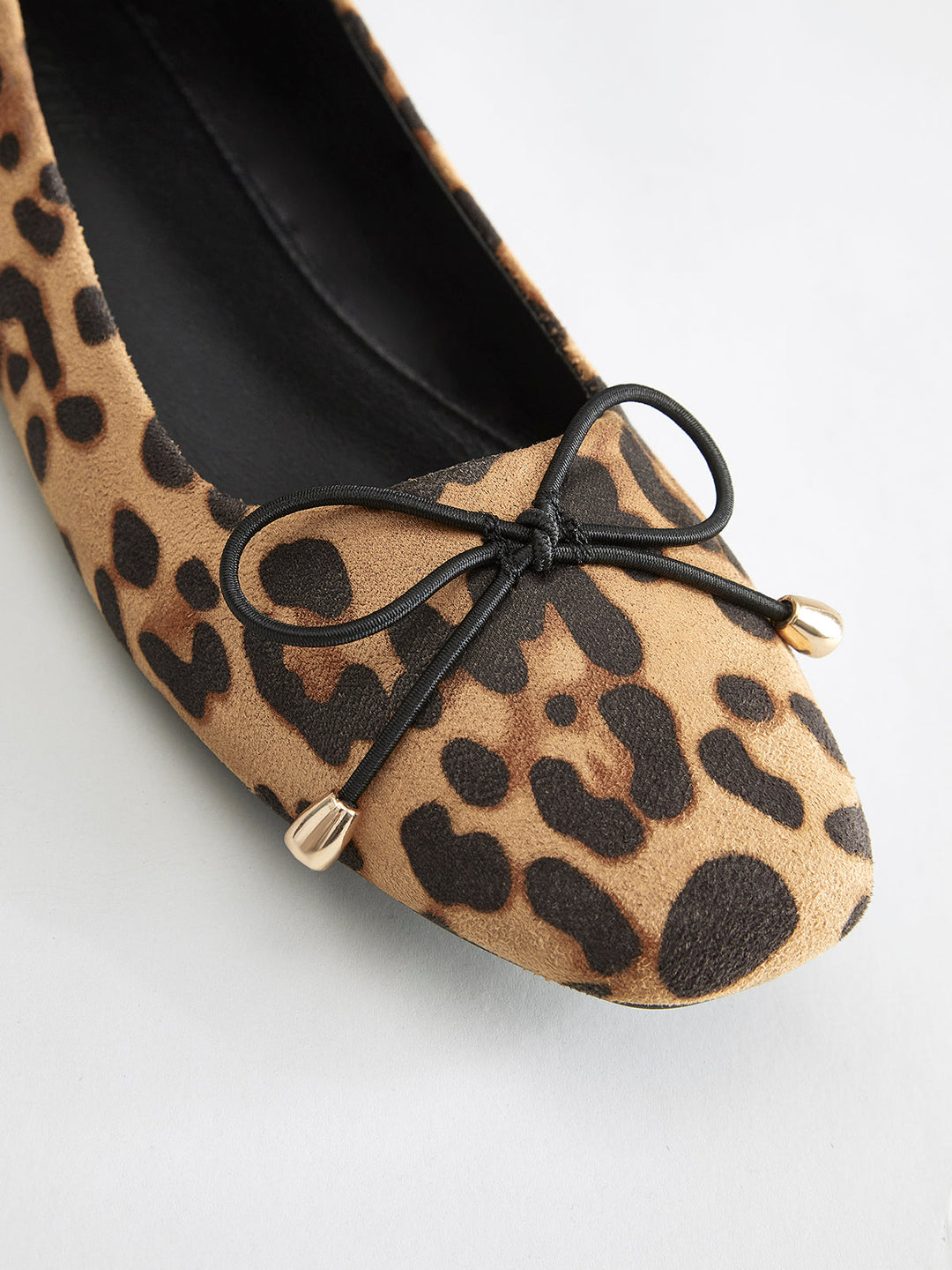 Ballerines imprimées léopard avec décoration de nœud
