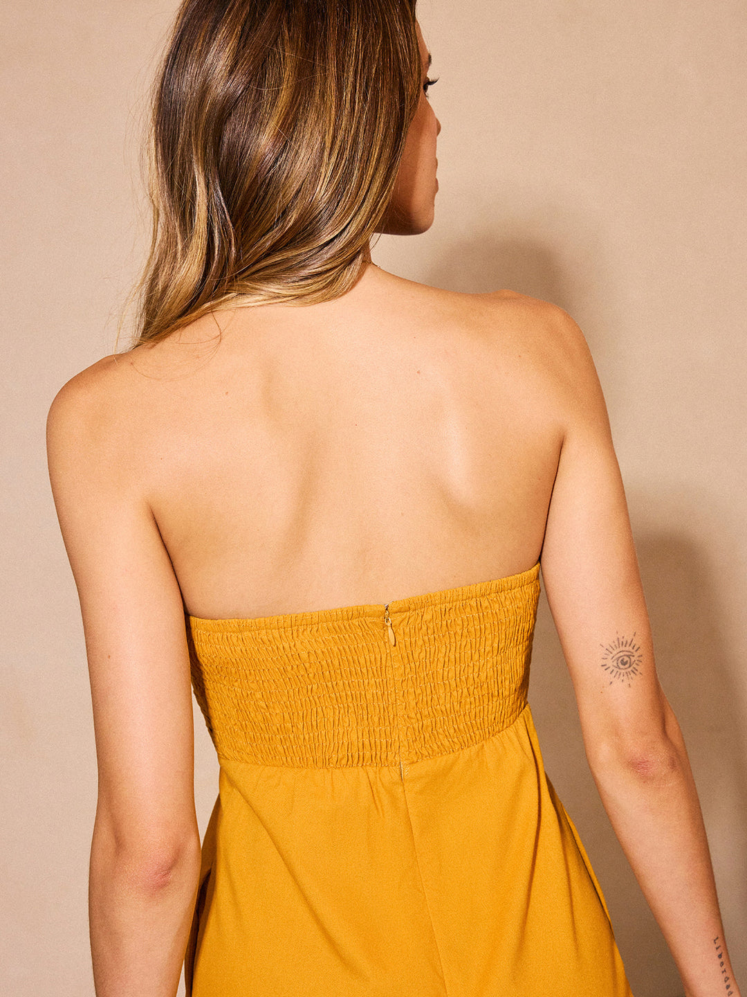 Combinaison bustier à jambes larges drapées