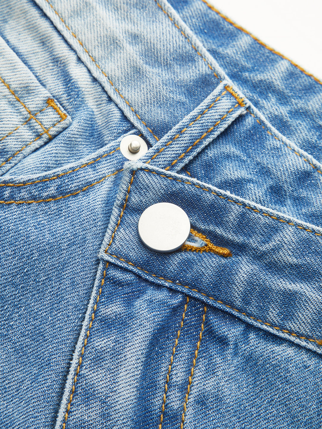 Shorts en jean délavé à taille asymétrique