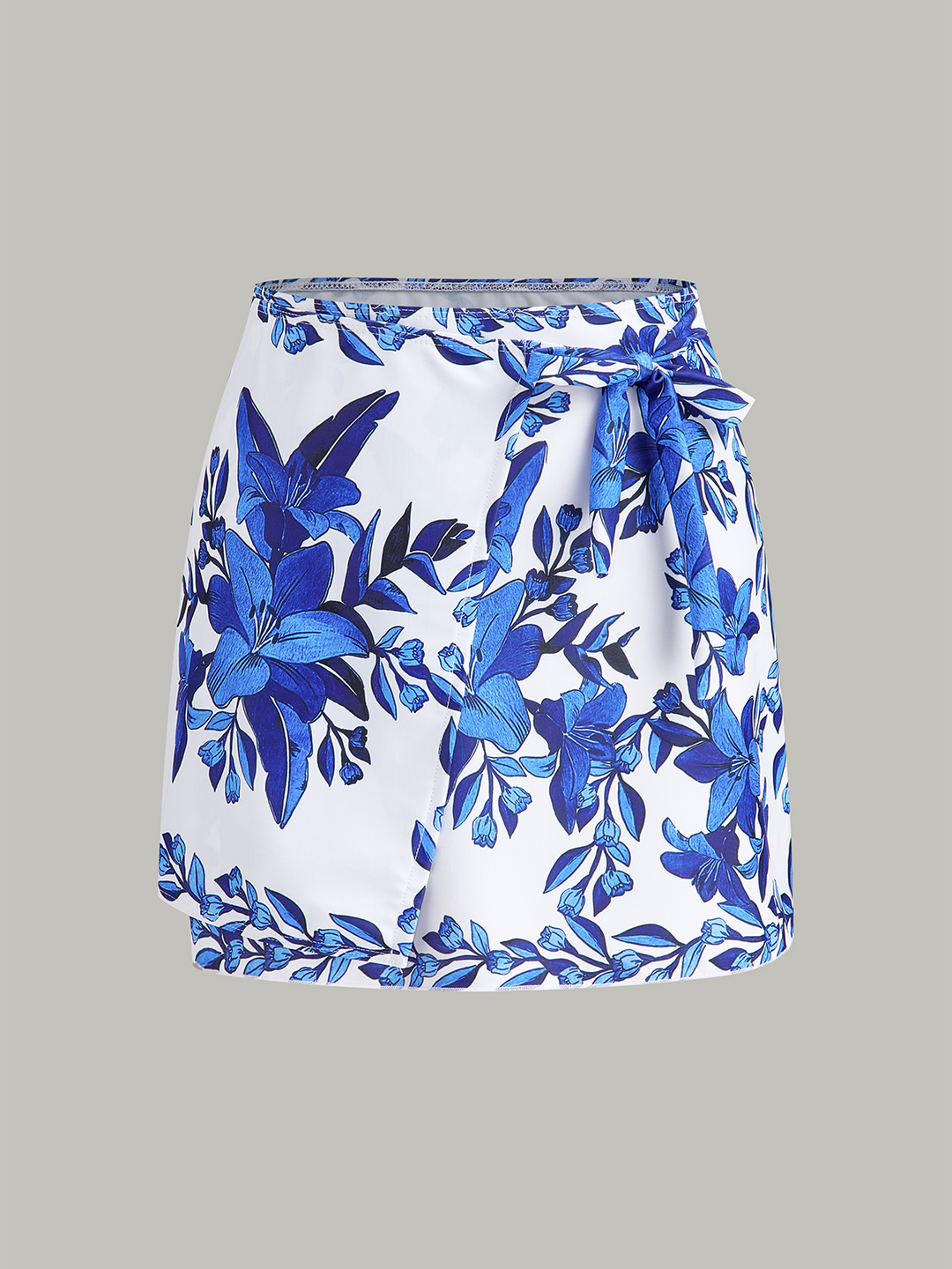 Maillot de bain une-pièce à dos lacé à imprimé floral avec jupe de plage